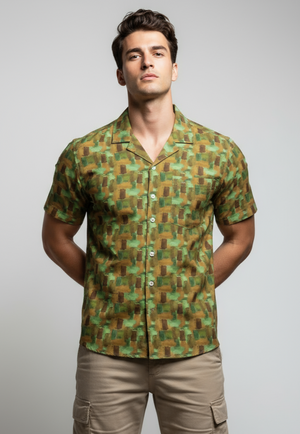 Man wearing a patterned shirt with geometric design on a plain background