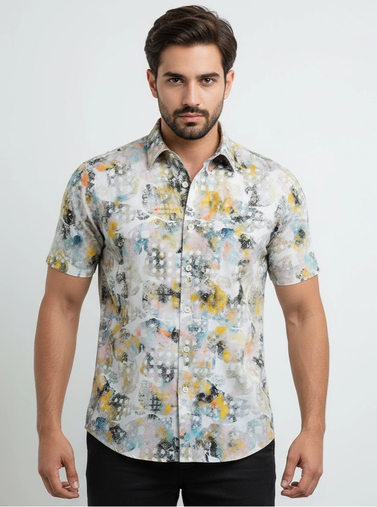 Man wearing a floral short-sleeve shirt on a white background