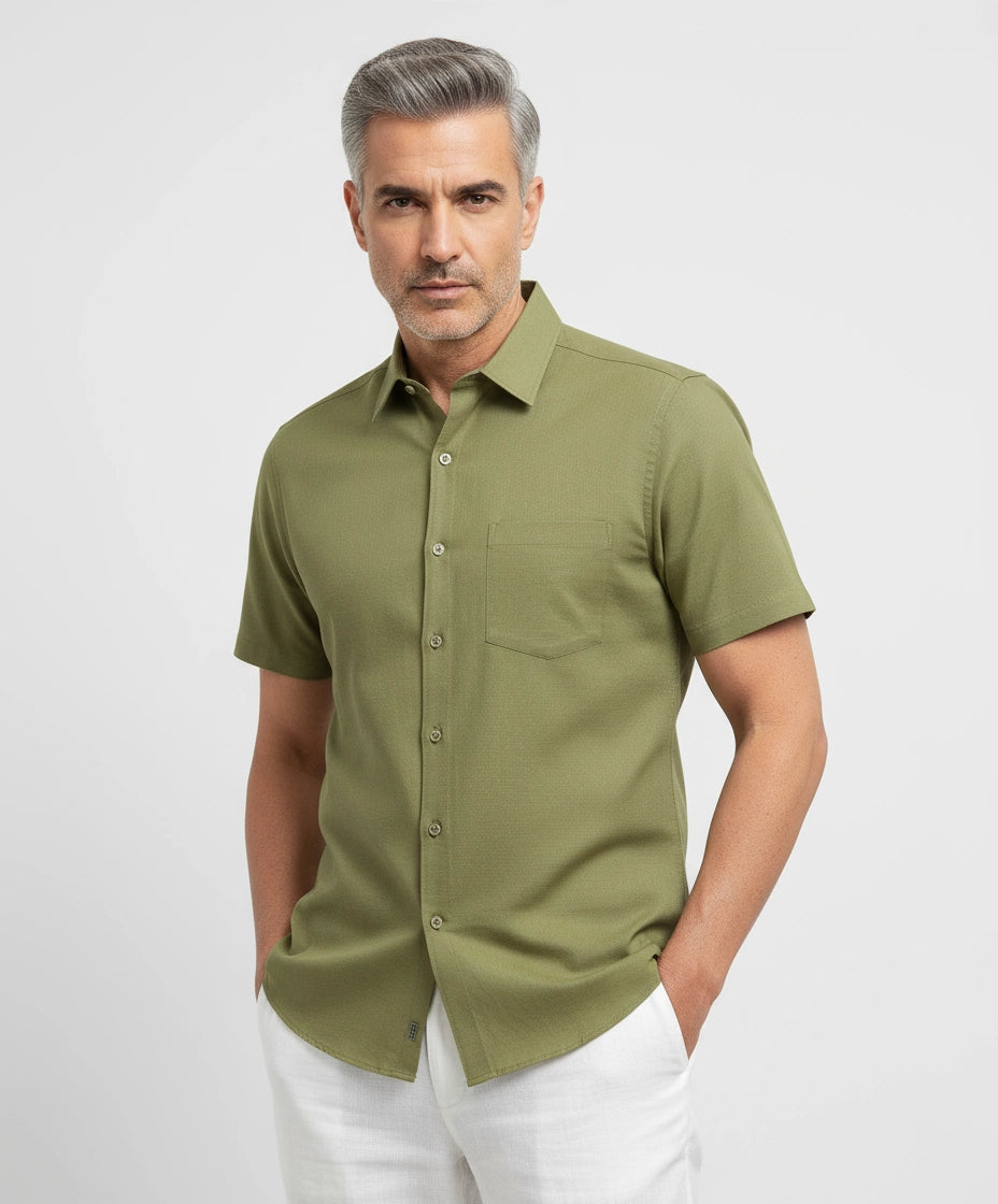 Man wearing light green olive men short-sleeve shirt. Spread Collar.