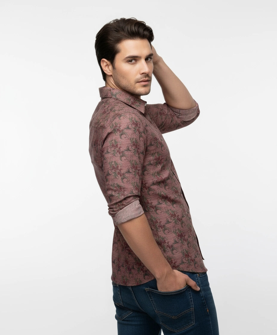 Man wearing a Reddish-brown rust color floral  patterned men shirt , full sleeves.