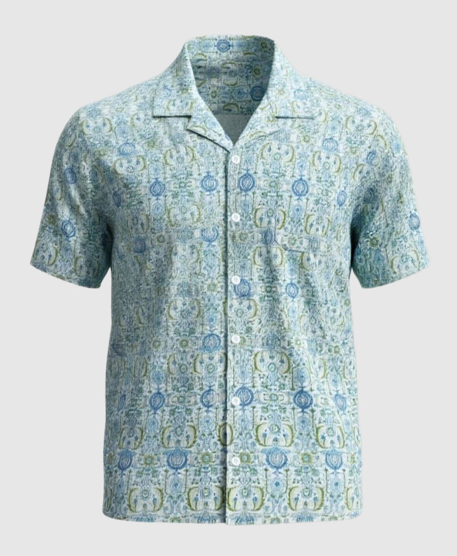 Short-sleeve shirt with a blue and green pattern on a white background