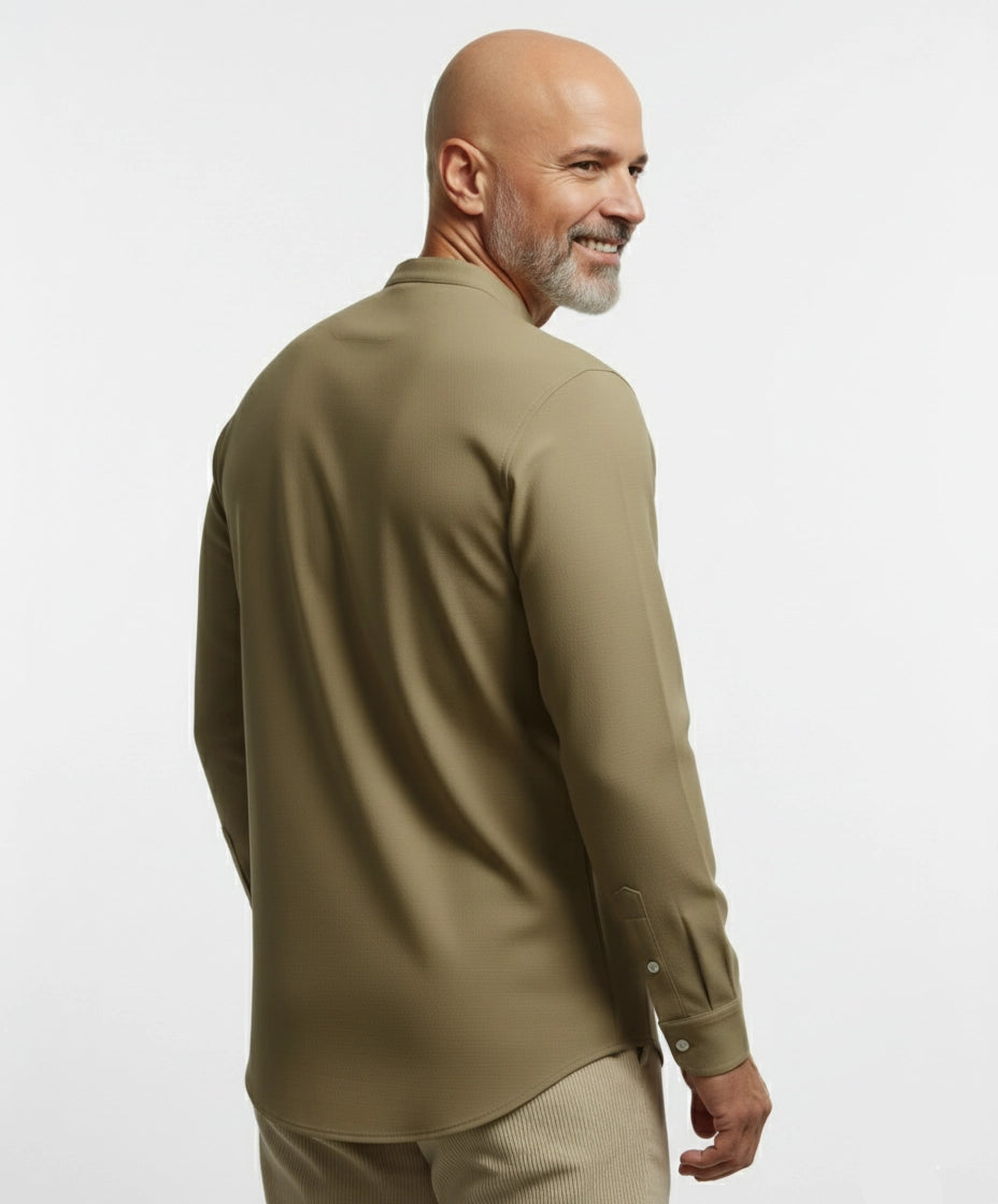Man wearing beige, Khaki, light brown long-sleeve shirt for men. Mandarin Collar.
