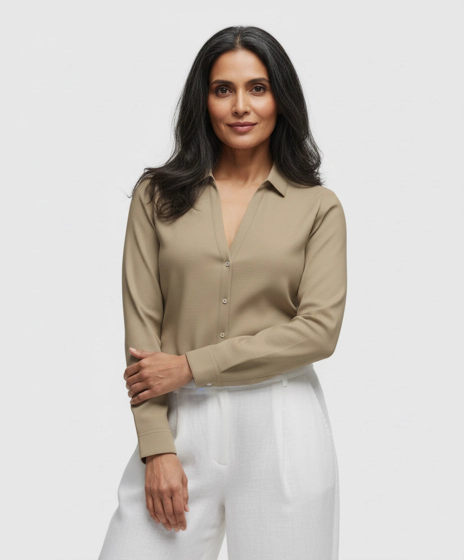 Woman wearing Light brown, beige, khaki shirt for women with full sleeve and deep v neck.