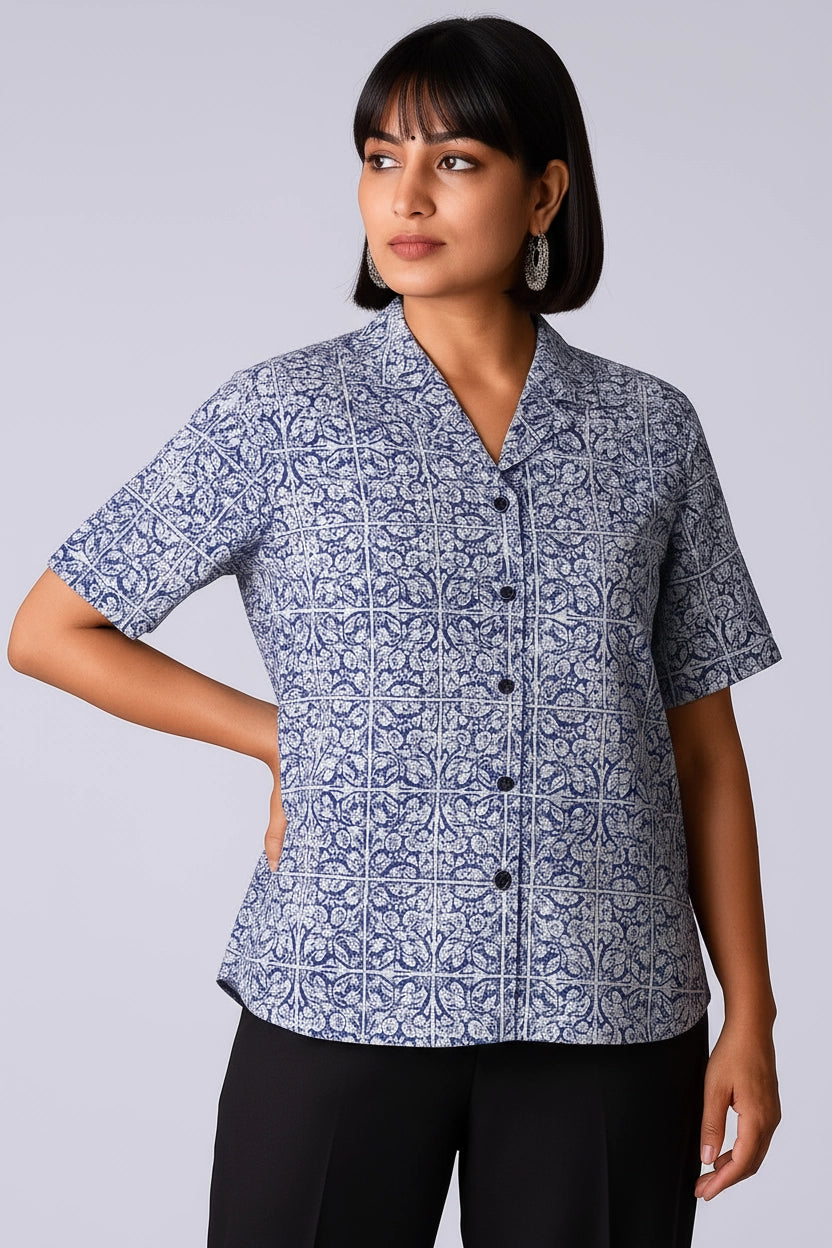 Short-sleeve women shirt with a blue floral and geometric pattern , cuban collar