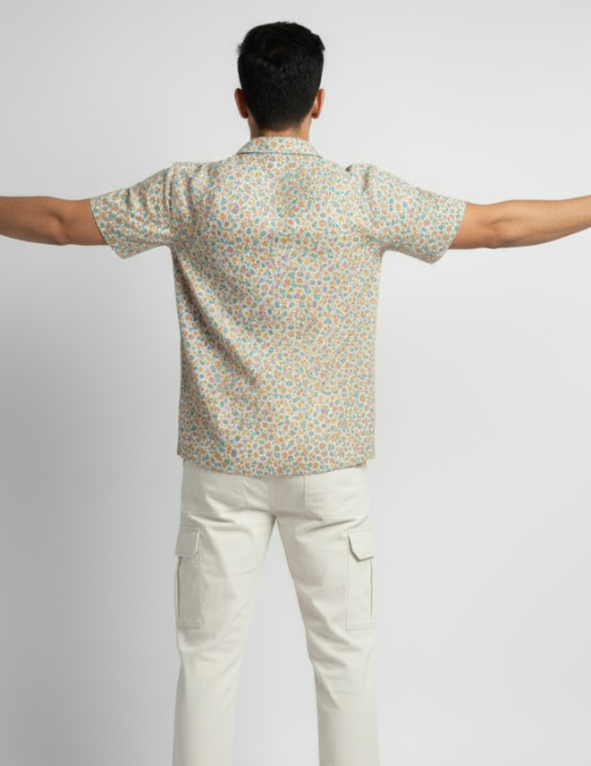 Man wearing a Short-sleeve floral shirt on a white background, cuban collar