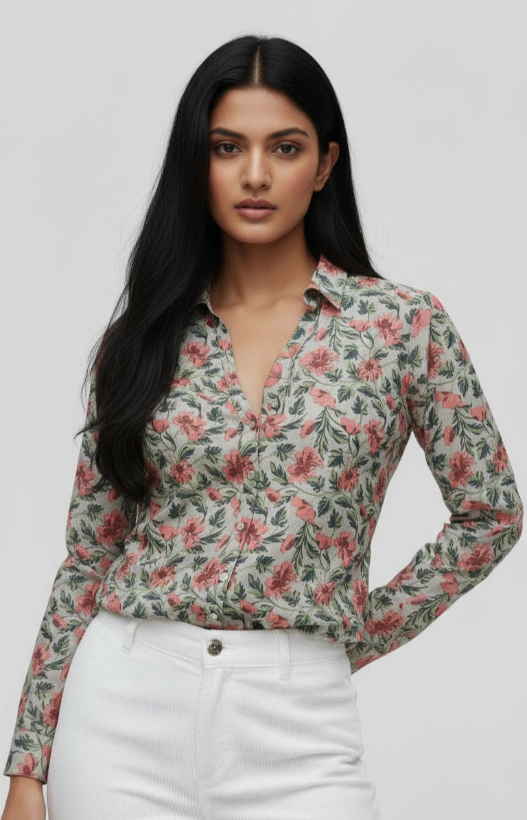 Woman wearing beige color women shirt with green and red floral pattern, deep v neck, full sleeves. 