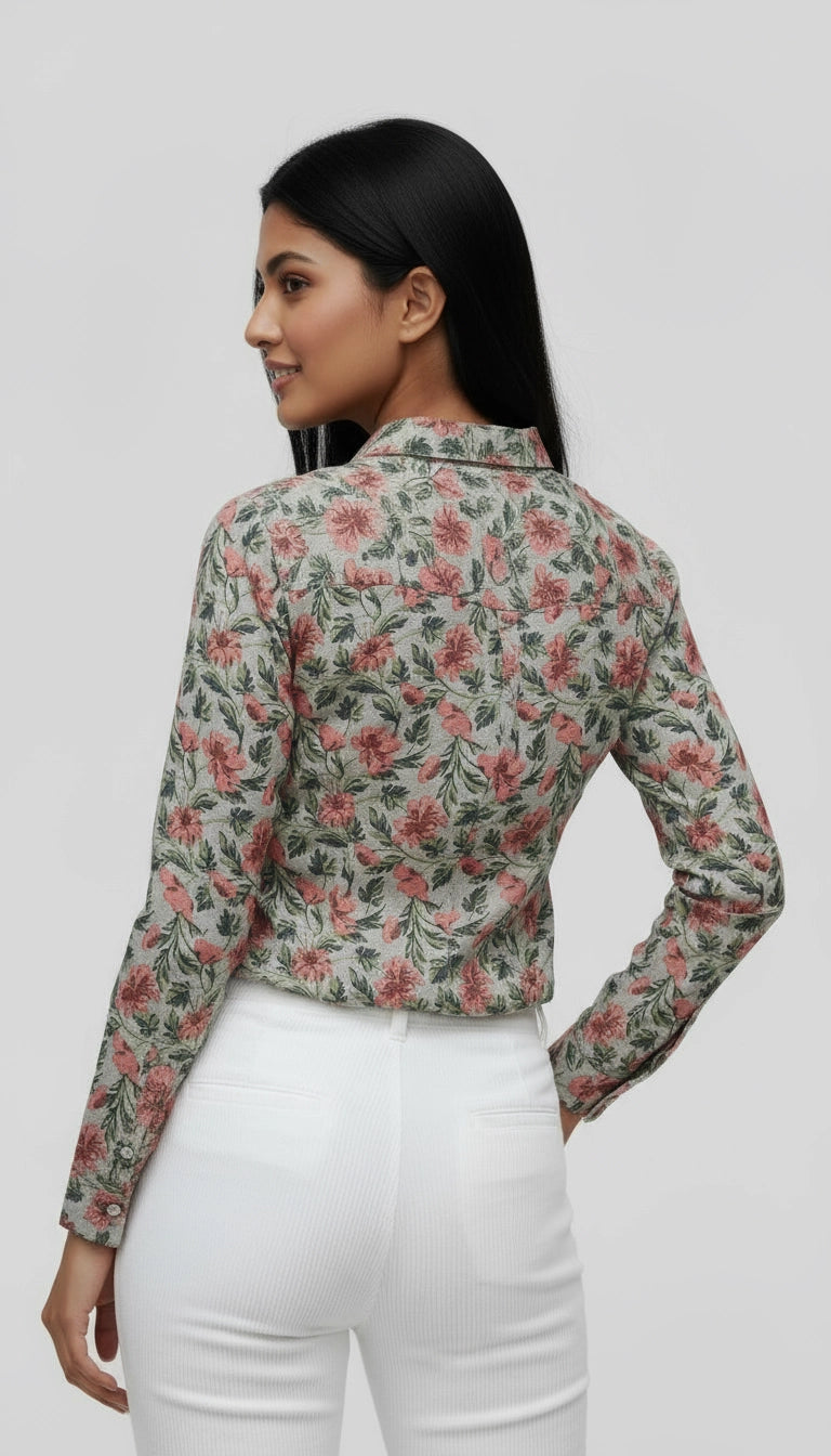 Woman wearing beige color women shirt with green and red floral pattern, deep v neck, full sleeves. 