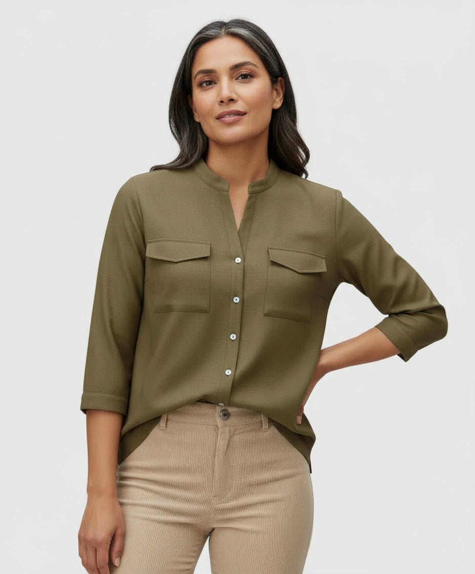 Woman wearing Dark brown Khaki shirt form women with two pockets, three fourth sleeves and mandarin collar.
