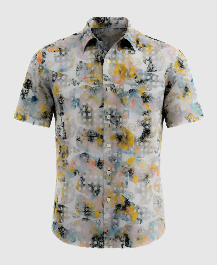 Short-sleeve shirt with abstract multicolor pattern on a white background