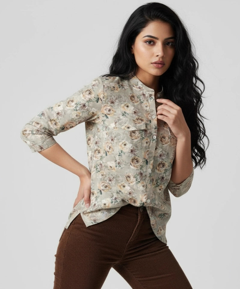 Woman wearing Light grey and beige floral pattern women shirt, mandarin collar, three fourth sleeves.