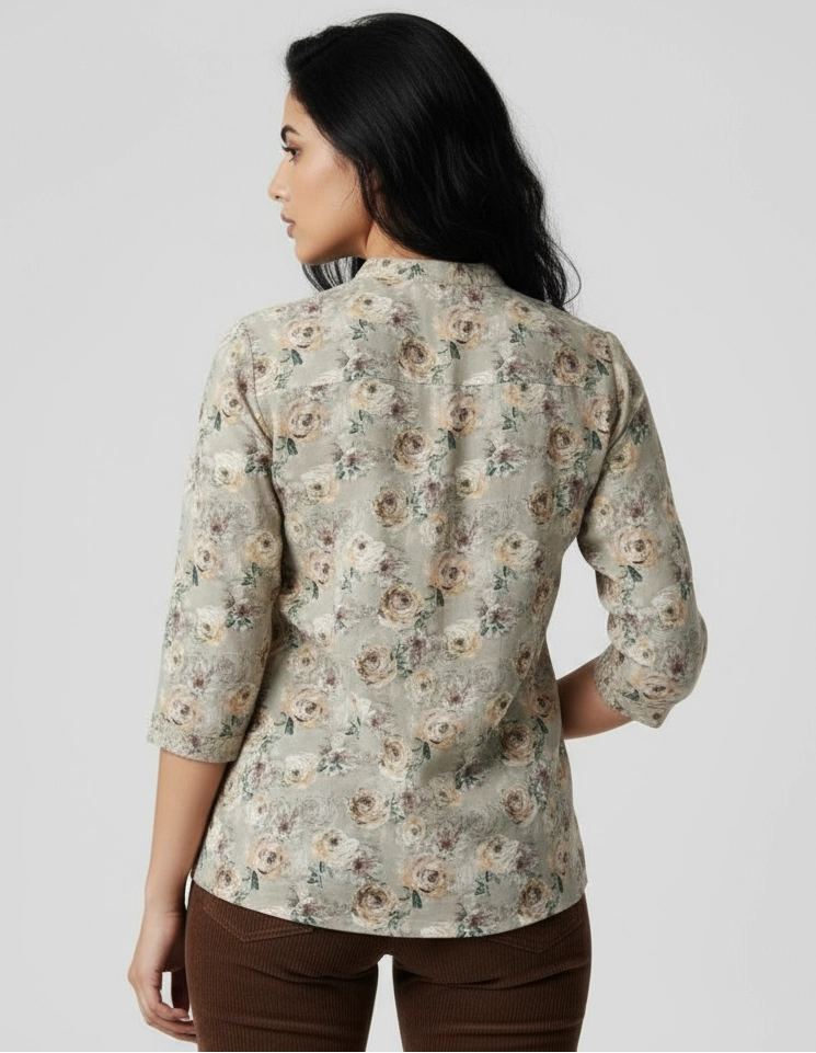 Woman wearing Light grey and beige floral pattern women shirt, mandarin collar, three fourth sleeves.
