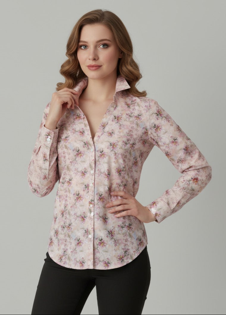 Woman wearing  red and pink  Floral patterned women shirt  with V neck and full sleeves.